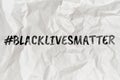 Hashtag black lives matter on wrinkled paper Royalty Free Stock Photo