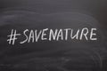 Hashtag save the nature on the chalk Board