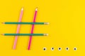 Hashtag sign from crossed colorful pencils on yellow background Royalty Free Stock Photo