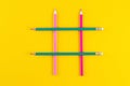 Hashtag sign from crossed colorful pencils on yellow background Royalty Free Stock Photo