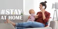 Hashtag Stay At Home - protective measure during coronavirus pandemic, banner design. Young mother with her baby in room