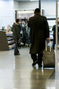 Hasid airport. orthodox with a suitcase is going around the airport