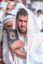 Hasid pilgrim in the crowd on the city street. holiday Rosh Hashanah, Jewish New Year