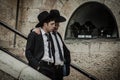 A Hasidic Jewish man wears a fur hat