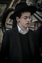 A Hasidic Jewish man wears a fur hat