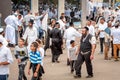 Hasids pilgrims in traditional clothes. The father leads the son by the hand. Rosh hashanah holiday, Jewish New Year.