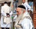 Hasids pilgrims in traditional clothes. Tallith - jewish prayer shawl. Rosh-ha-Shana festival, Jewish New Year. Royalty Free Stock Photo