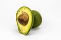 Fresh Avocados and cut piece composition Royalty Free Stock Photo