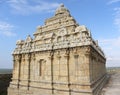Hassan, Karnataka, India - September 12, 2009 Jain temple with ornate tower on top of mountain