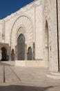 Hassan 2 mosque in Casablanca Morocco 12/31/2019 with doorway arch and blue sky Royalty Free Stock Photo