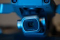 Hasselblad digital photo or video camera illuminated with blue light, the camera is mounted on the DJ Magic 2 Pro drone