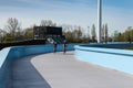 Hasselt, Limburg, Belgium - Two cyclist driving the blue biking bridge over the Albert canal