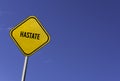 hastate - yellow sign with blue sky background Royalty Free Stock Photo