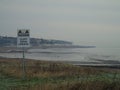 Hastings seafront view with warning sign