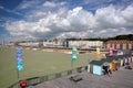 HASTINGS, UK - JULY 23, 2017: View of the seafront from the Pier rebuilt and open to public in 2016 with colorful huts in the fo