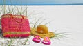 Hat, bag, and sandals on beach Royalty Free Stock Photo