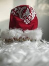 Hat and beard of santa claus light background Royalty Free Stock Photo