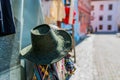 Hat in focus , gift shopon the medieval streets of Sighisoara, Romania