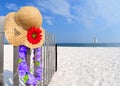 Hat and Lei on Fence Royalty Free Stock Photo