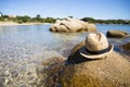 Hat on rock near beach Royalty Free Stock Photo