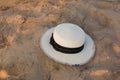Hat on sand. straw hat. sand. summer