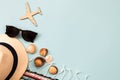 Hat, sunglasses, airplane, shells, background for travel advertising, text, Royalty Free Stock Photo