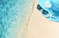 Hat and sunglasses on the sandy beach. Summer background Royalty Free Stock Photo