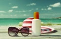 Hat, sunglasses and sun lotion Royalty Free Stock Photo