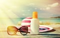 Hat, sunglasses and sun lotion. Royalty Free Stock Photo