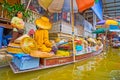 The hat vendor in Damnoen Saduak floating market, Thailand