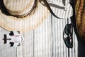 A hat, white flip flops, sunglasses, aircraft, a beach bag on the white wooden table Royalty Free Stock Photo