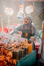 Hat Yai, Thailand- December 15, 2023 A Hijab Woman Selling Variety of Drinks at Khlong Hae Floating Market. Visit Thailand Royalty Free Stock Photo