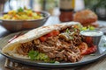 Hatay style chicken doner, with small pickled peppers and a glass of ayran