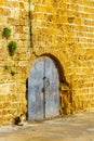 Hatch in the land wall, old city of Acre Akko Royalty Free Stock Photo