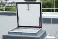 hatch for roof access roof covered with bitumen membrane Royalty Free Stock Photo