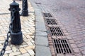 Hatches of the drainage system of the road. Royalty Free Stock Photo