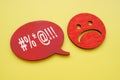 Hate speech or rudeness concept. Unhappy face and quote bubble. Royalty Free Stock Photo