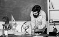 Hate studying. education child development. back to school. bearded man teacher with small girl in classroom. daughter