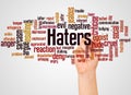 Haters word cloud and hand with marker concept Royalty Free Stock Photo