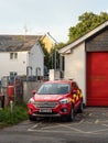 HATHERLEIGH, DEVON, ENGLAND - AUGUST 9 2022: An emergency EV vehicle attached to charger point.
