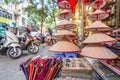 Hats in front of the shop in Hanoi