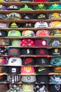 Hats on shelves on a vendor`s street stall on Bangla Road, Patong beach, Phuket, Thailand