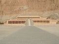 The huge and impressive Hatshepsut Temple with stone cliff behind Royalty Free Stock Photo