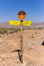 Trail signpost with directions on a mountain hiking trail in Hatta, Hajar Mountains, United Arab Emirates