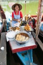 Woman selling deep fried potato at Klong Hae floating market, Hatyai, Thailand Royalty Free Stock Photo