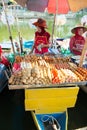 Woman selling fish cake sticks at Klong Hae floating market, Hatyai, Thailand Royalty Free Stock Photo