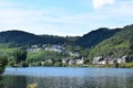 Hatzenport, Germany - 09 14 2023: camping island and hilltop settlement above the village