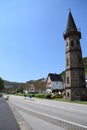 Hatzenport, Germany - 04 28 2022: Alter FÃÂ¤hrturm with waterfront road and parking