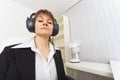 Haughty woman - producer with ear-phones