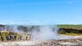 Tourists wait eruption of geyser in Haukadalur Royalty Free Stock Photo